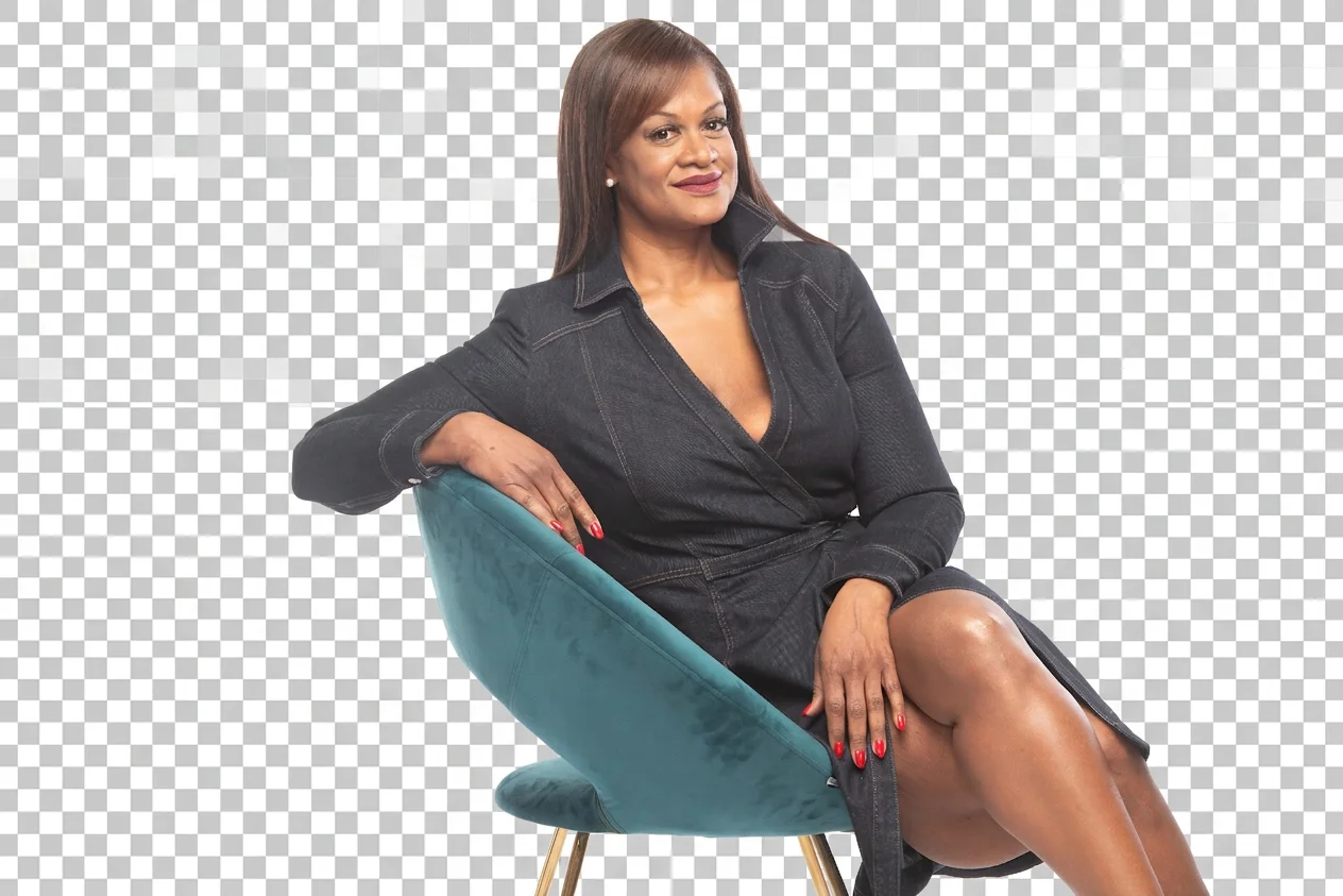 Portrait of Kathryn Finney seated in a teal chair